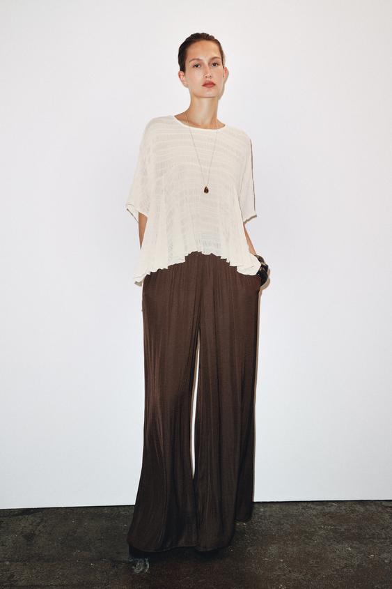 ASYMMETRIC TEXTURED CAPE BLOUSE