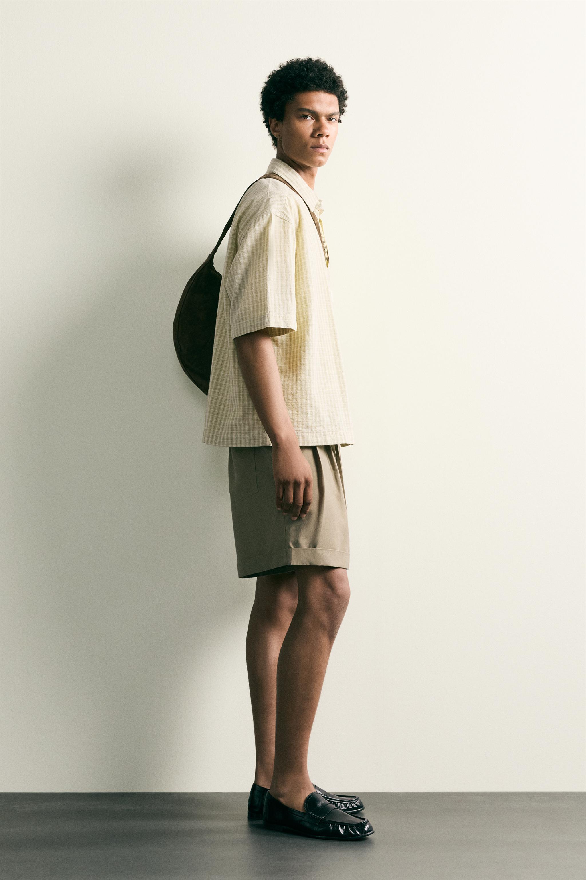 FLUID RELAXED FIT PLEATED SHORTS