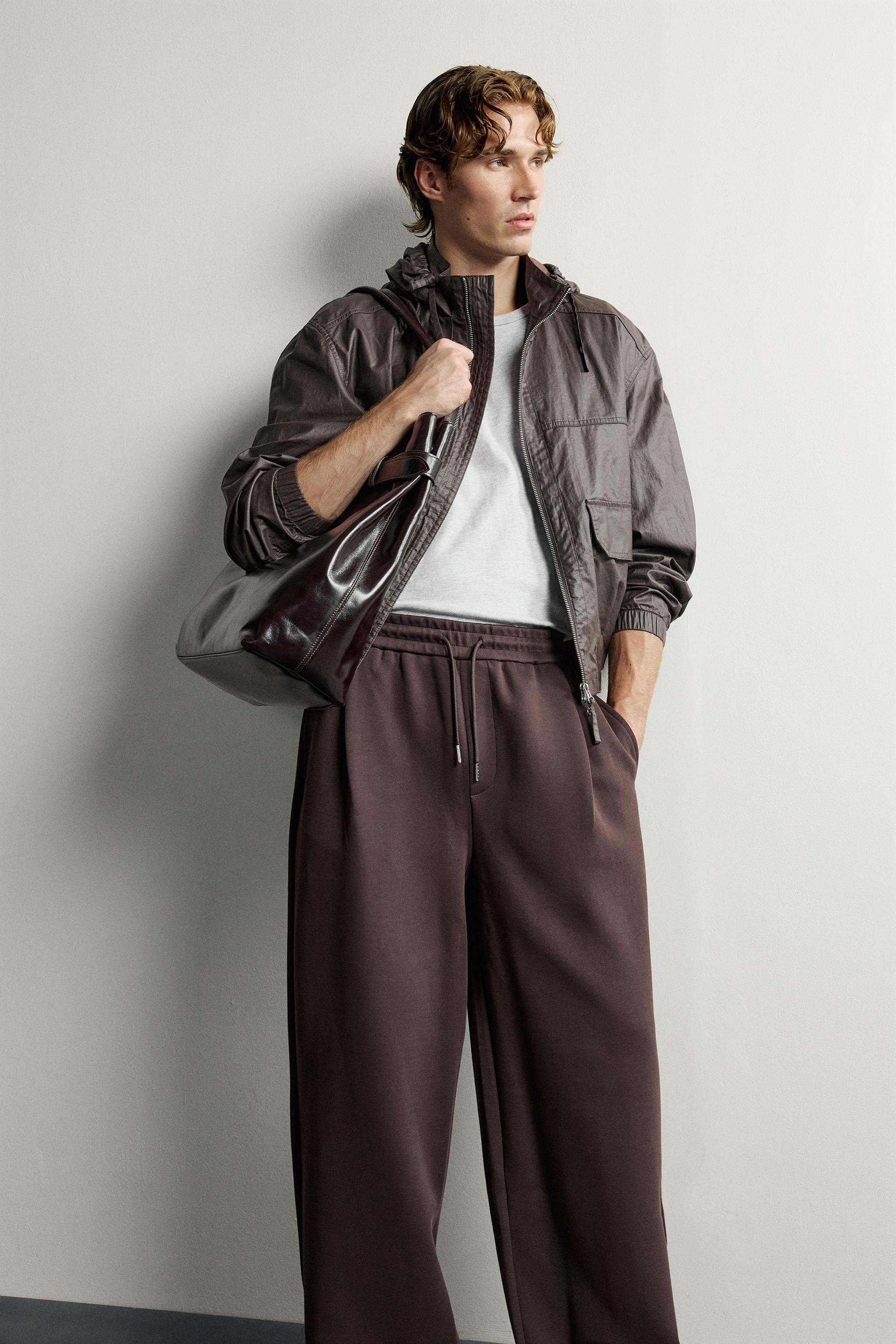 PLEATED BALLOON-FIT PANTS