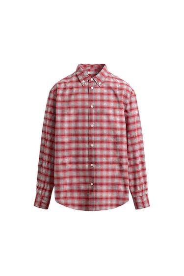 Long-sleeve shirt with a red and white plaid print, button-down collar, and a front button placket. ZARA label on the inside.