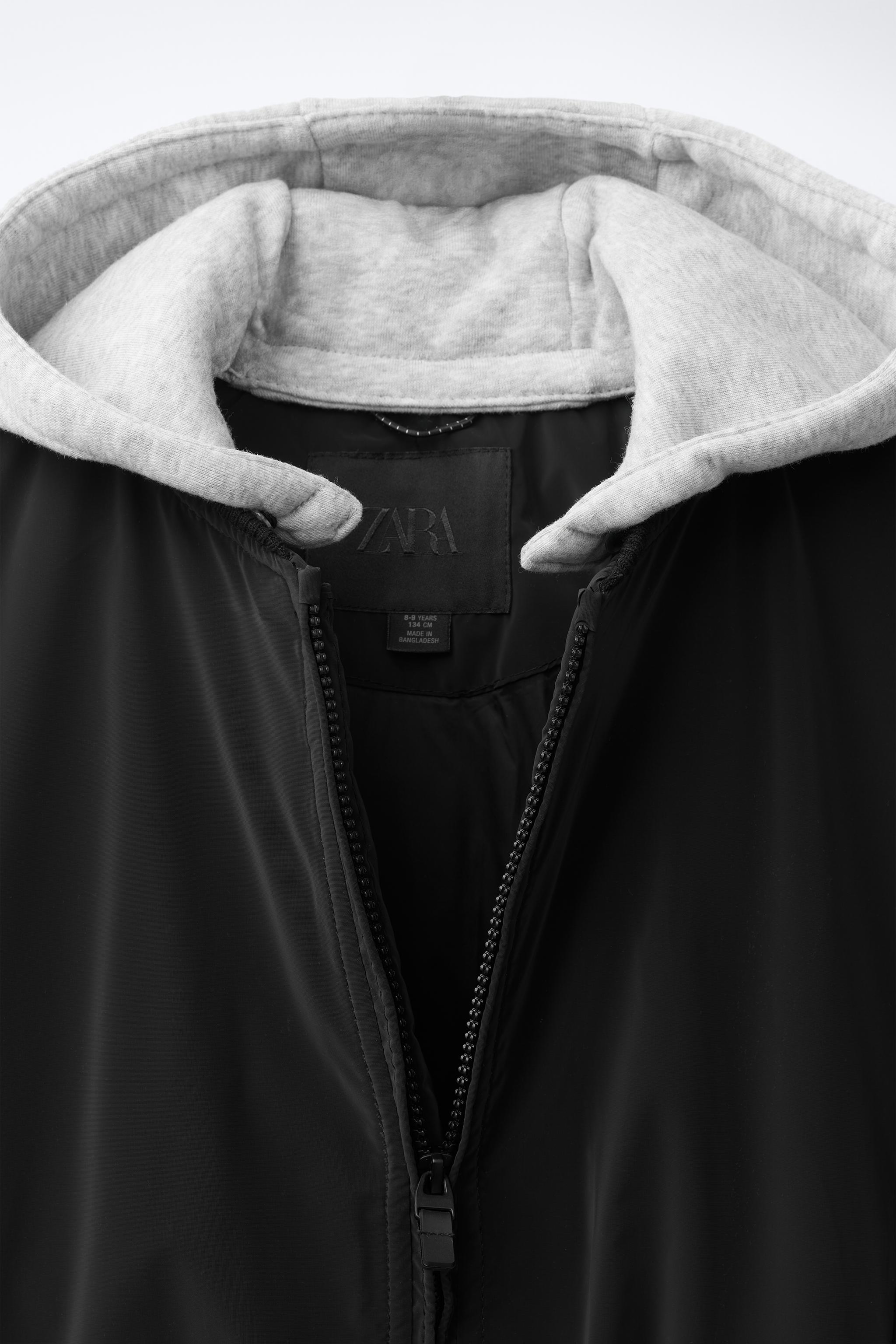 RUBBERIZED BOMBER JACKET WITH DETACHABLE HOOD