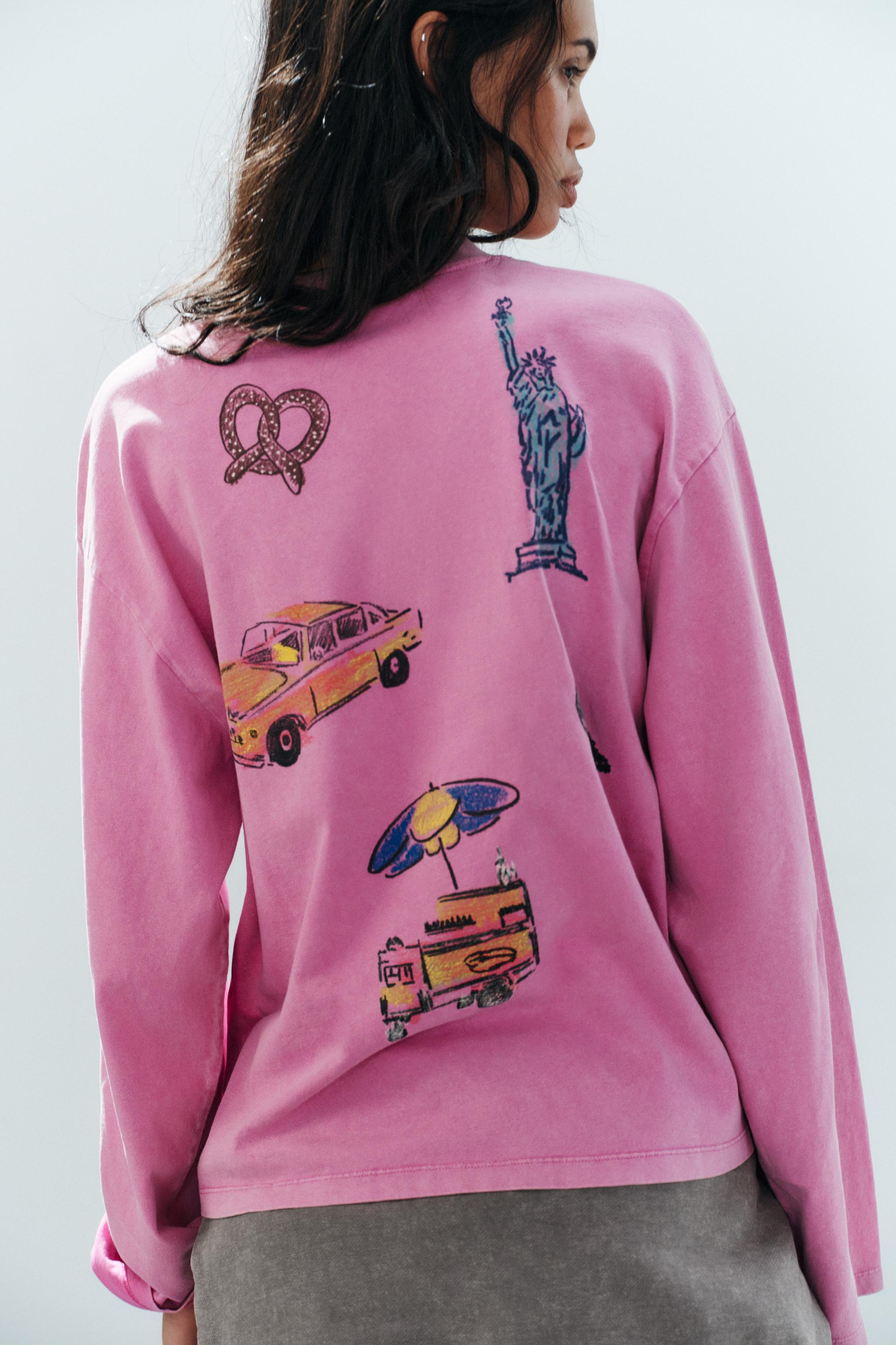 T-SHIRT EFFET DÉLAVÉ À DESSINS