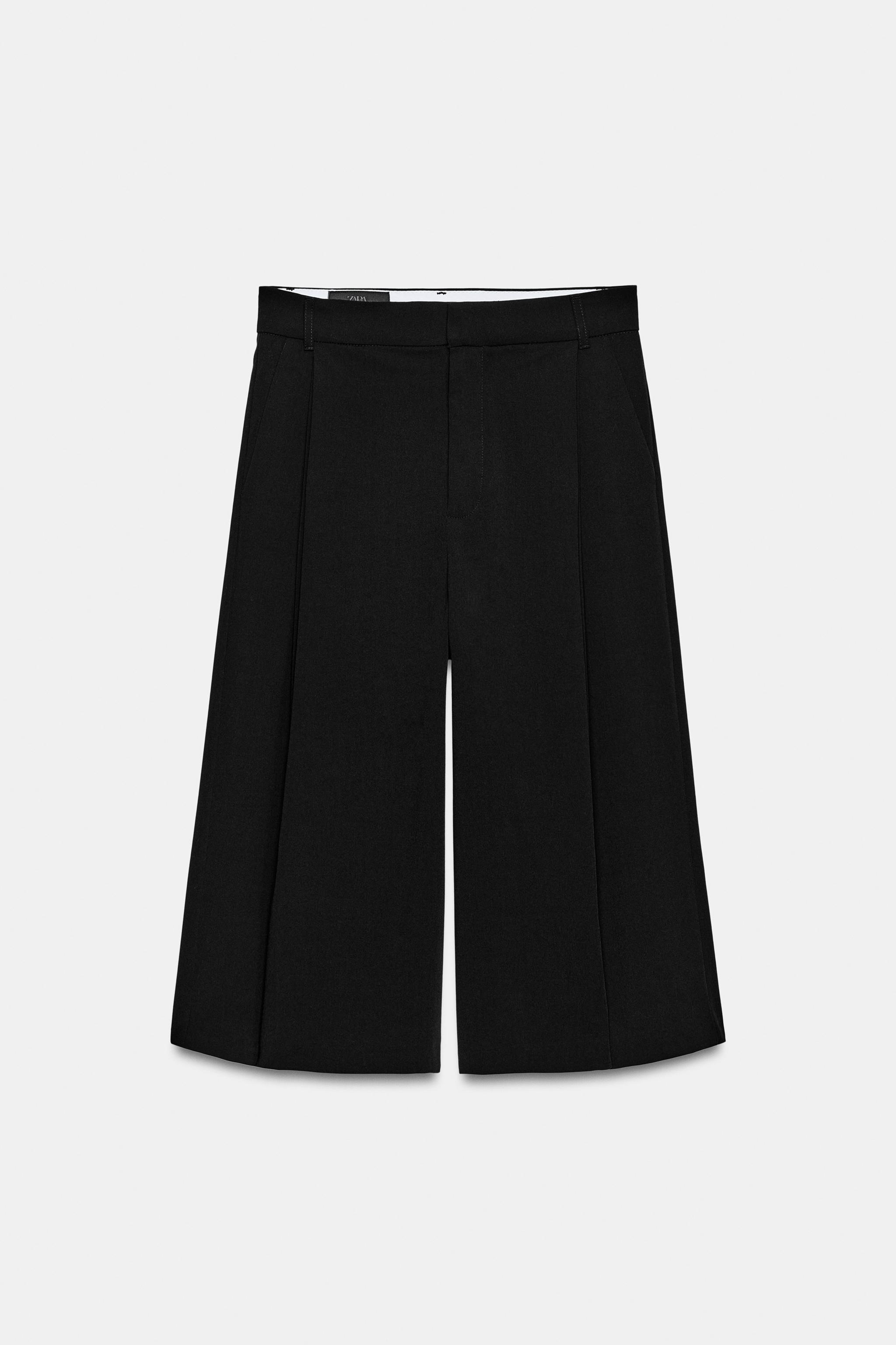 LONG PLEATED BERMUDA SHORTS