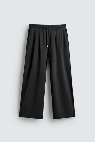بنطلون JOGGER بثنيات ناعم - أسود الخاص بـ Zara
