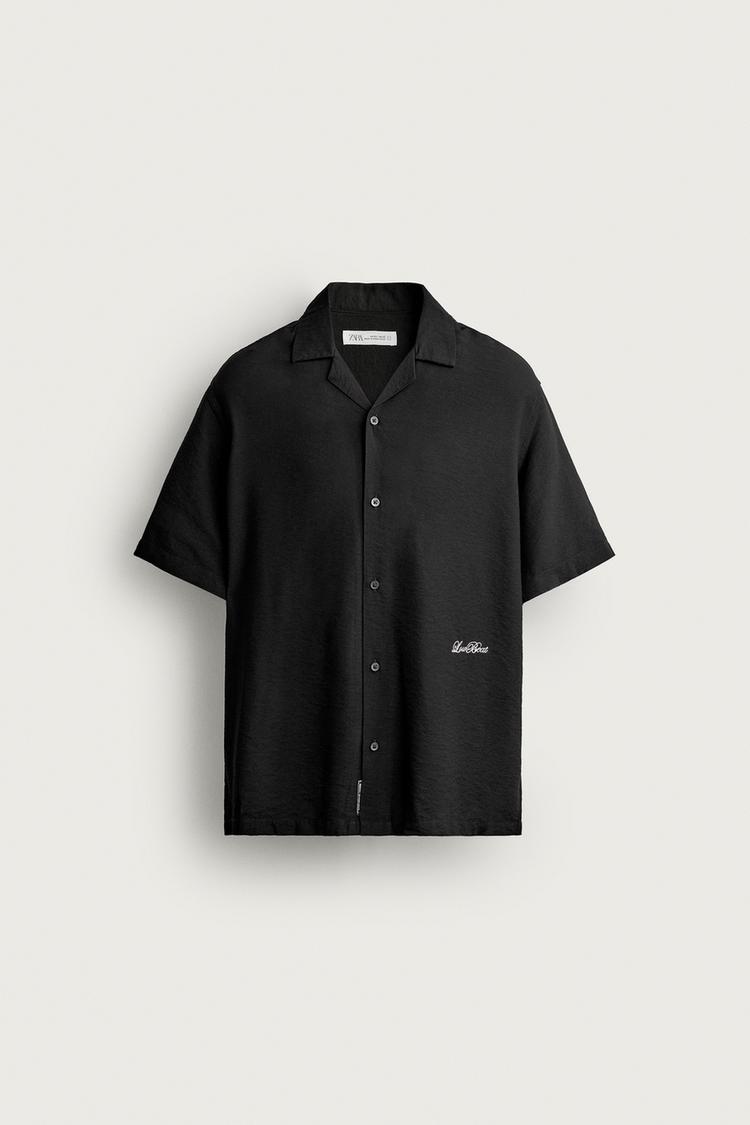 Camisa relaxed fit texto bordado