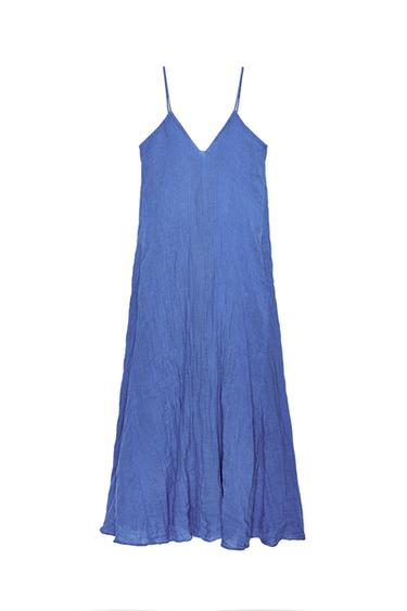 Front view of a blue dress with spaghetti straps and a full skirt.