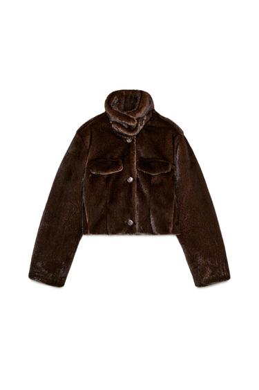Front view of a dark toasted short bomber jacket, faux fur effect, high neck, long sleeves, faux flap pockets.