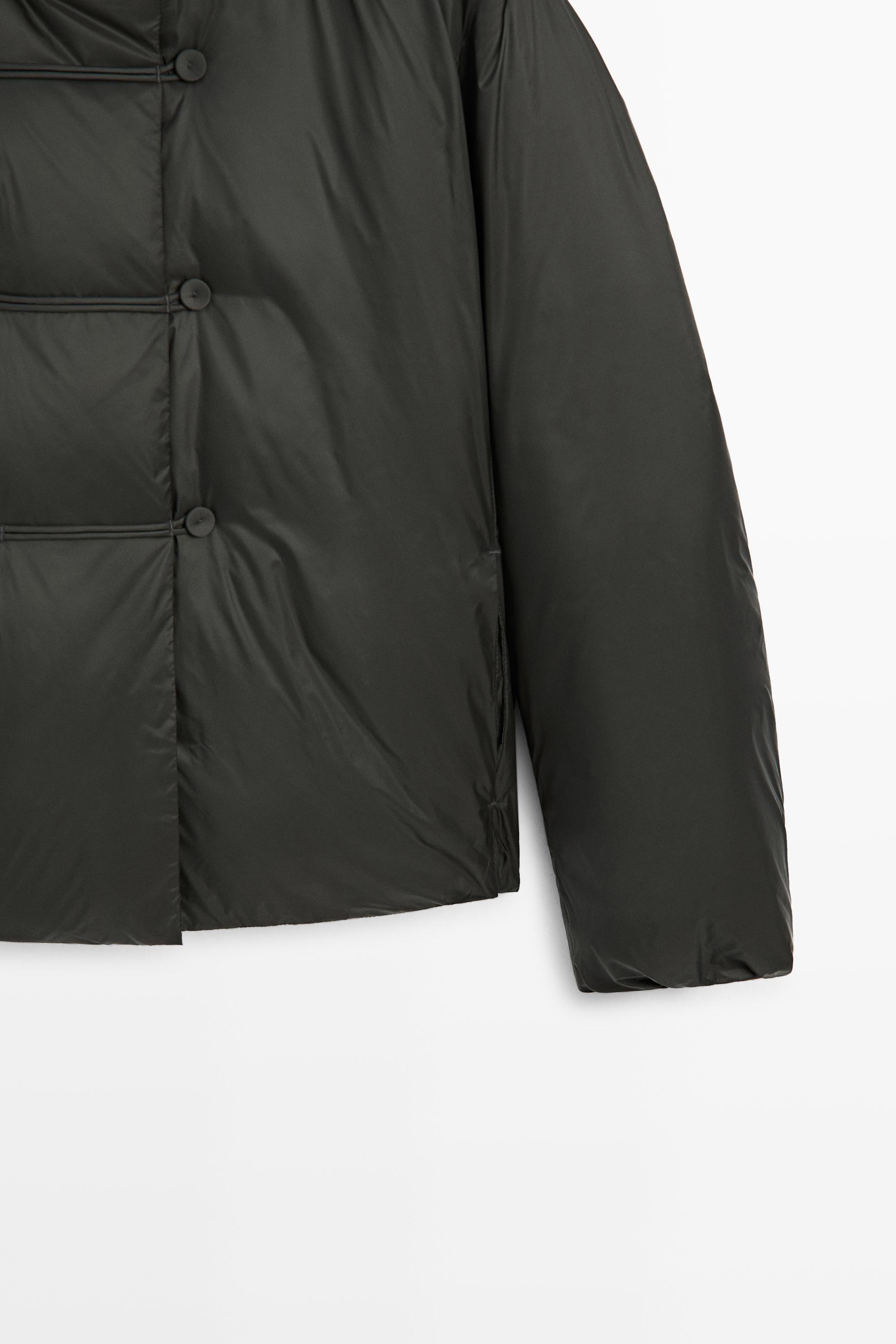Down jacket with toggle detail