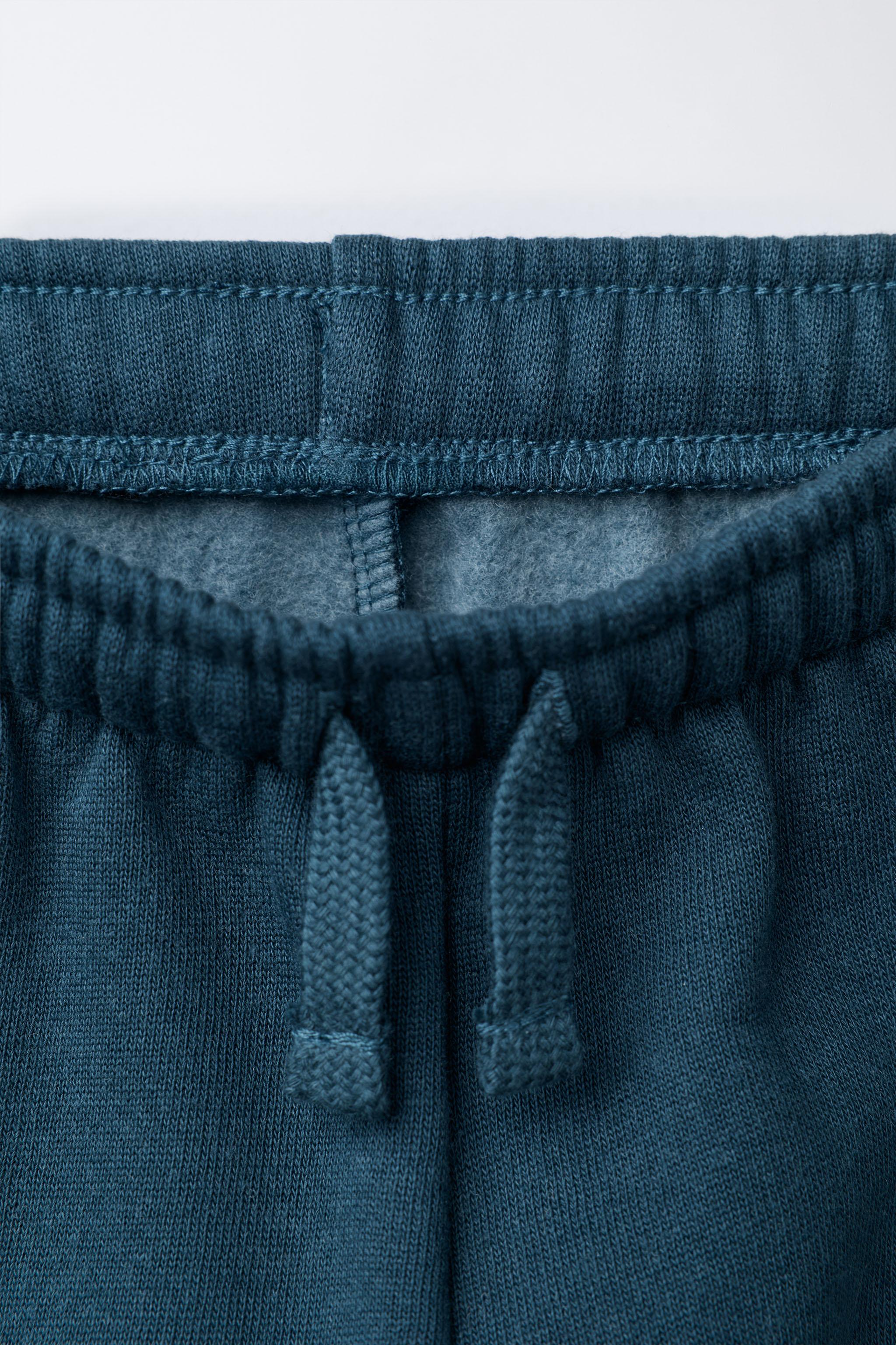 MICKEY MOUSE © DISNEY FLOCK JOGGER PANTS