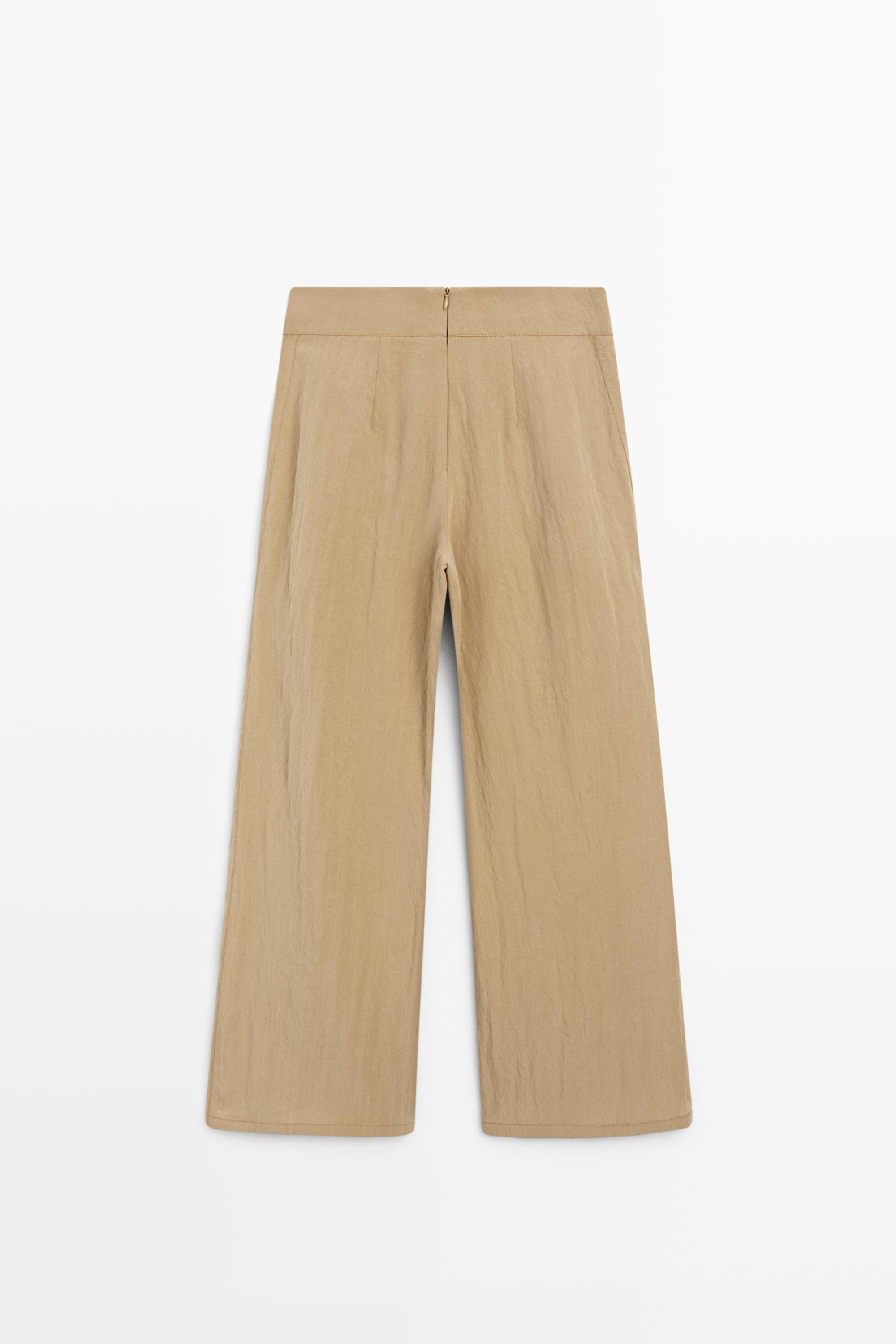 Pantalon palazzo à plis