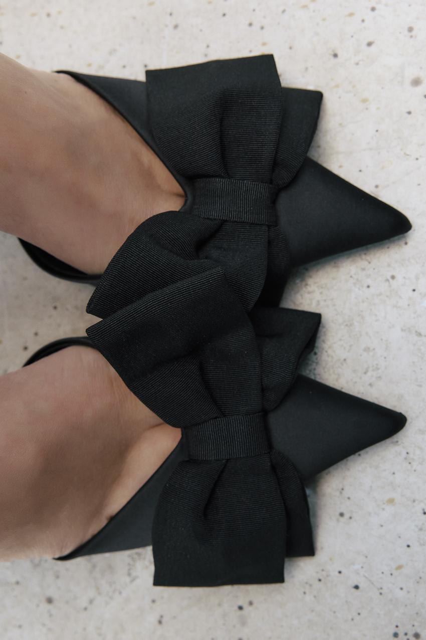 The Elegance of Black Bow Heel Shoes