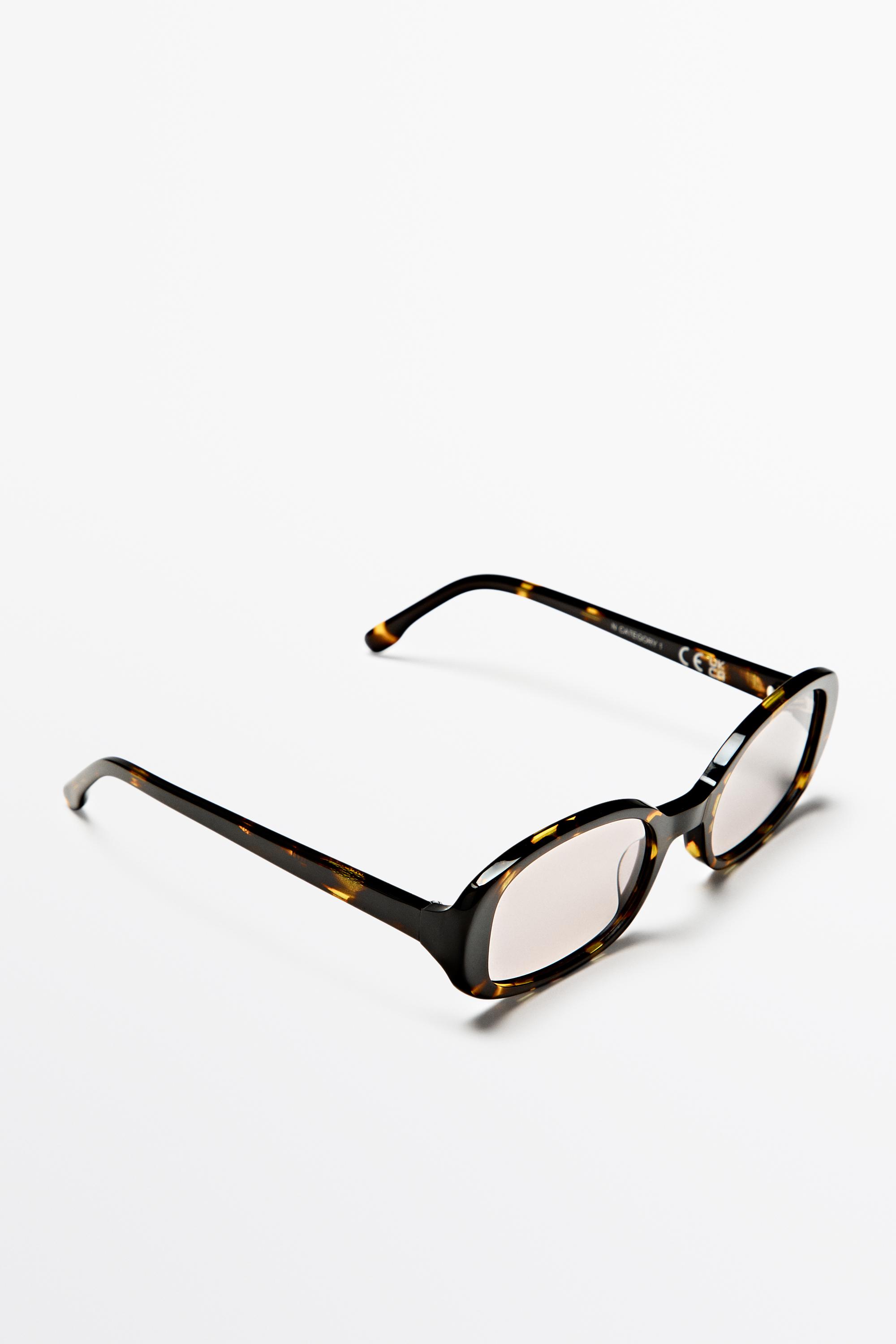 Oval tortoiseshell-effect sunglasses — 734