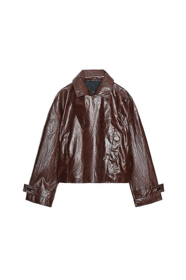 Front view of dark brown jacket with a sheen, notched lapel, long adjustable sleeves, and front pockets.