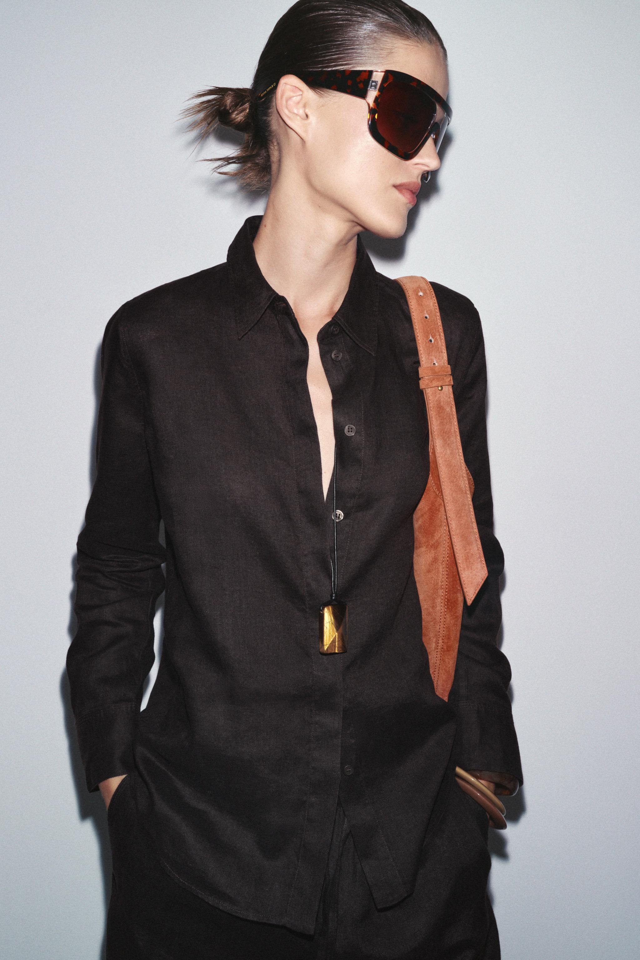 LEATHER MAXI BUCKET BAG WITH HANDLE DETAIL
