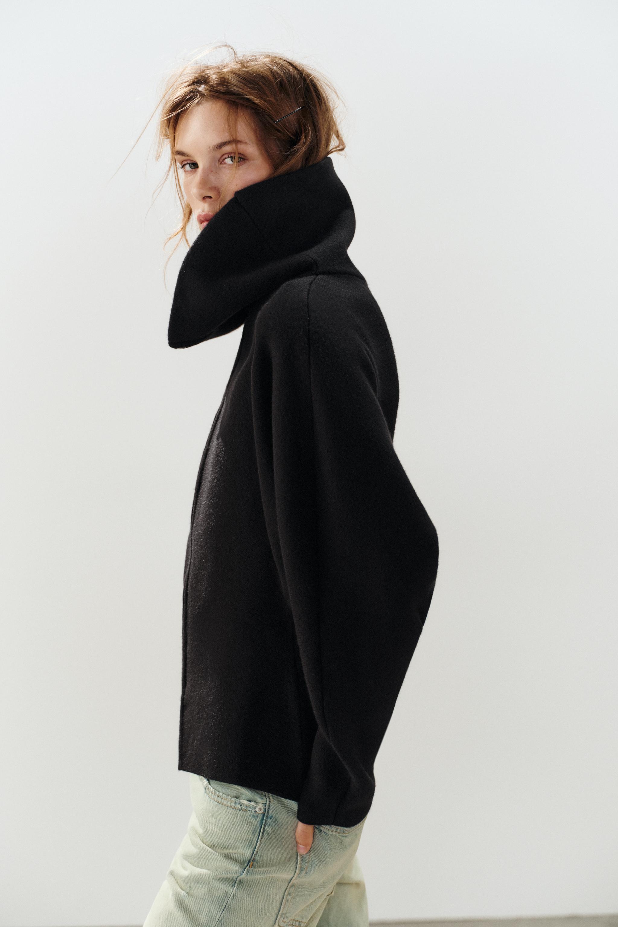 GILET EN MAILLE À COL MONTANT