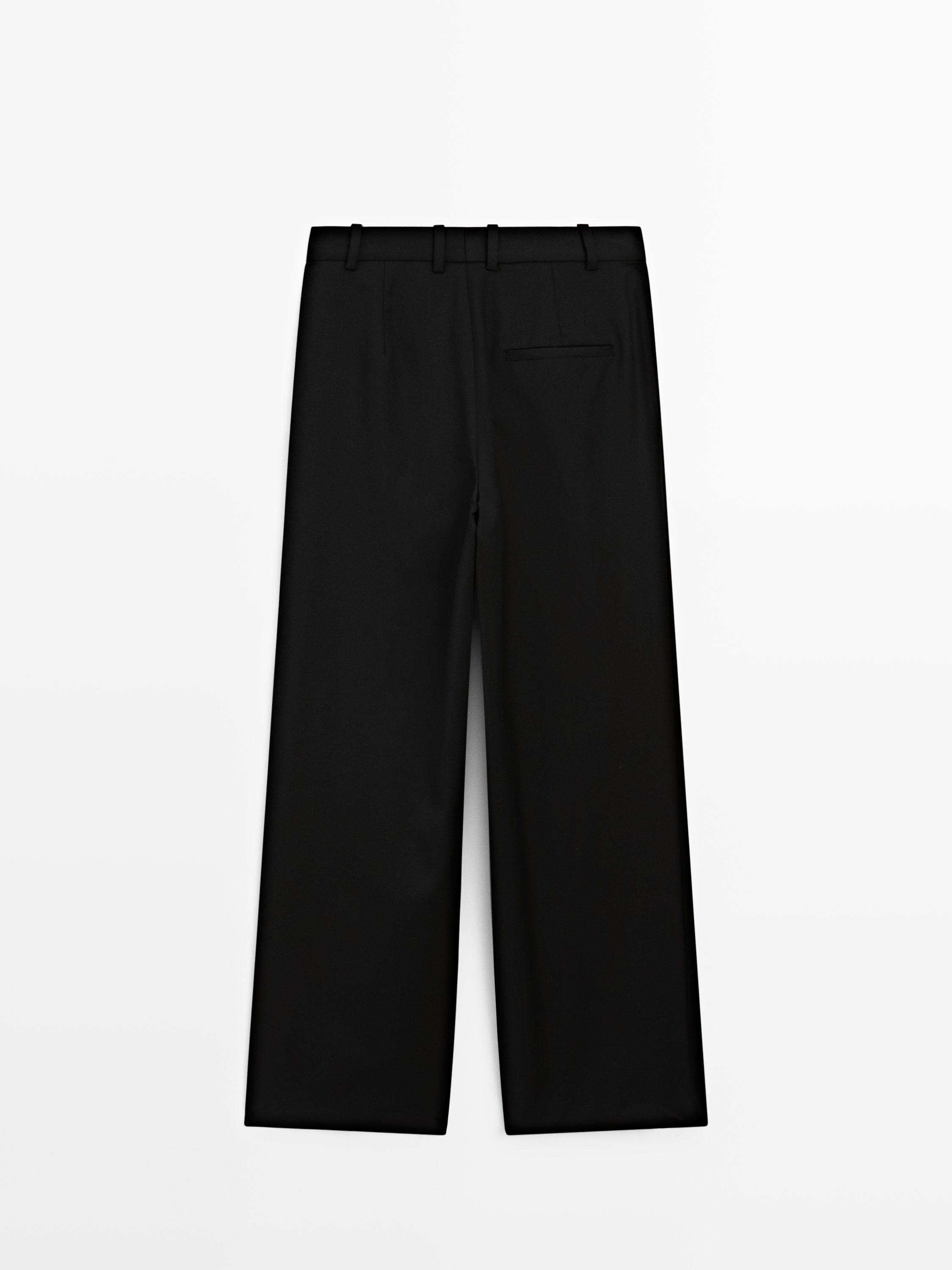 Pleated extra fine wool trousers