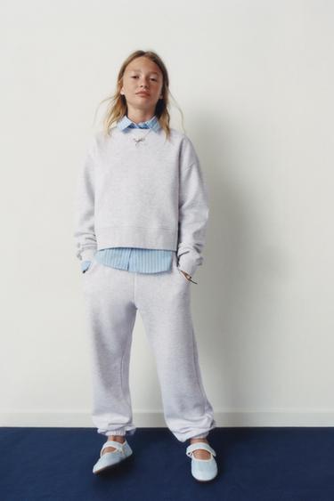 سويت شيرت JOGGING بيزك - رمادي فيجوريه الخاص بـ Zara