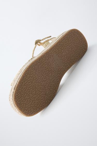 SANDALIA YUTE TRENZADA - Oro de Zara