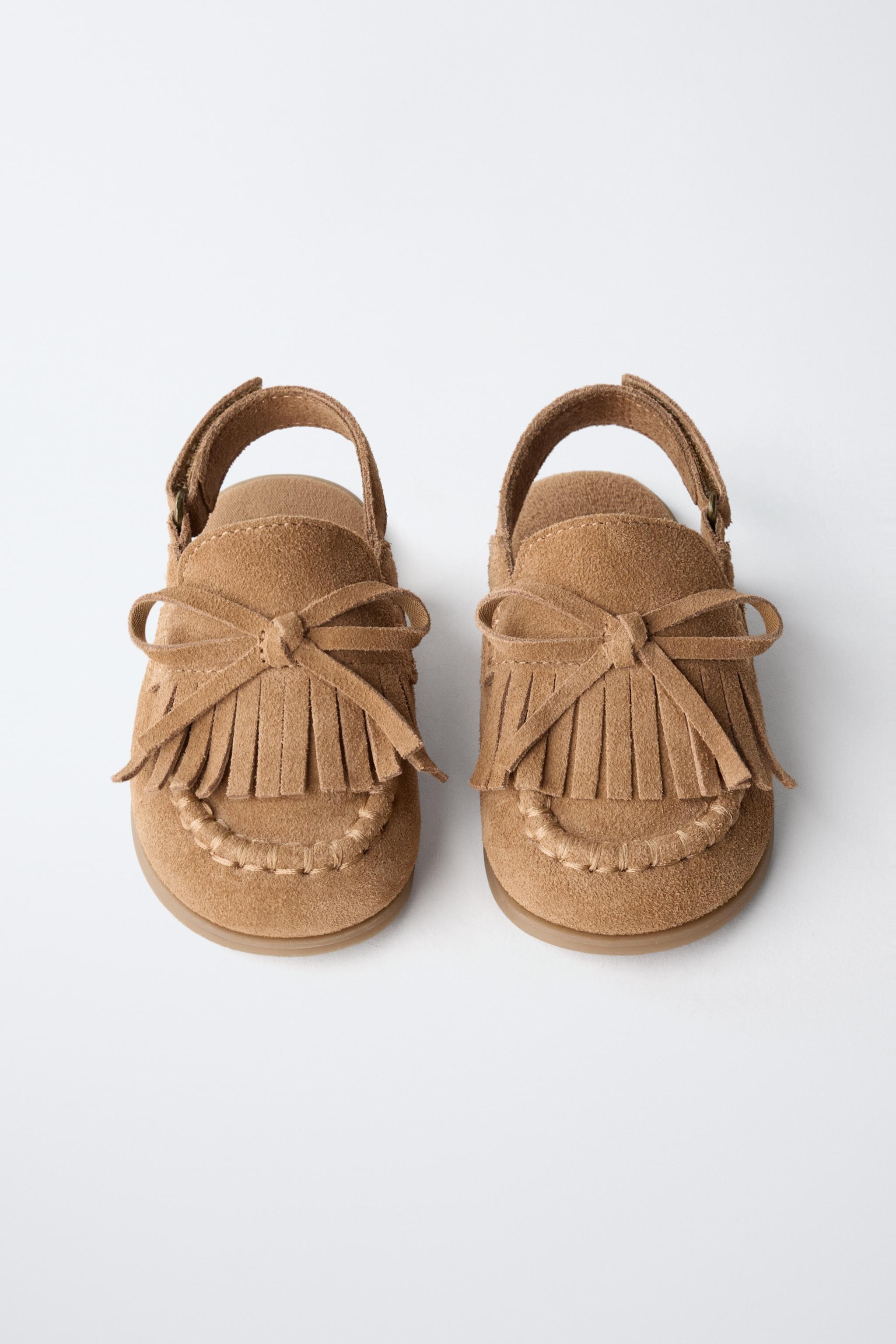 SABOTS EN CUIR PIEDS NUS