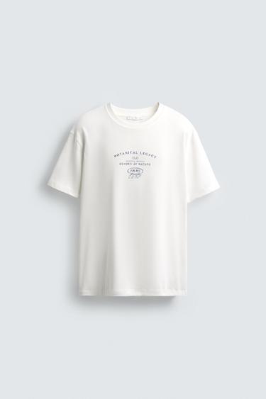 تيشرت بنص مطبع - أبيض مكسور الخاص بـ Zara