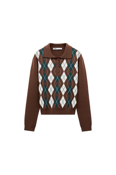 Front view of a brown jumper with a white and green argyle pattern, collar and front button fastening.