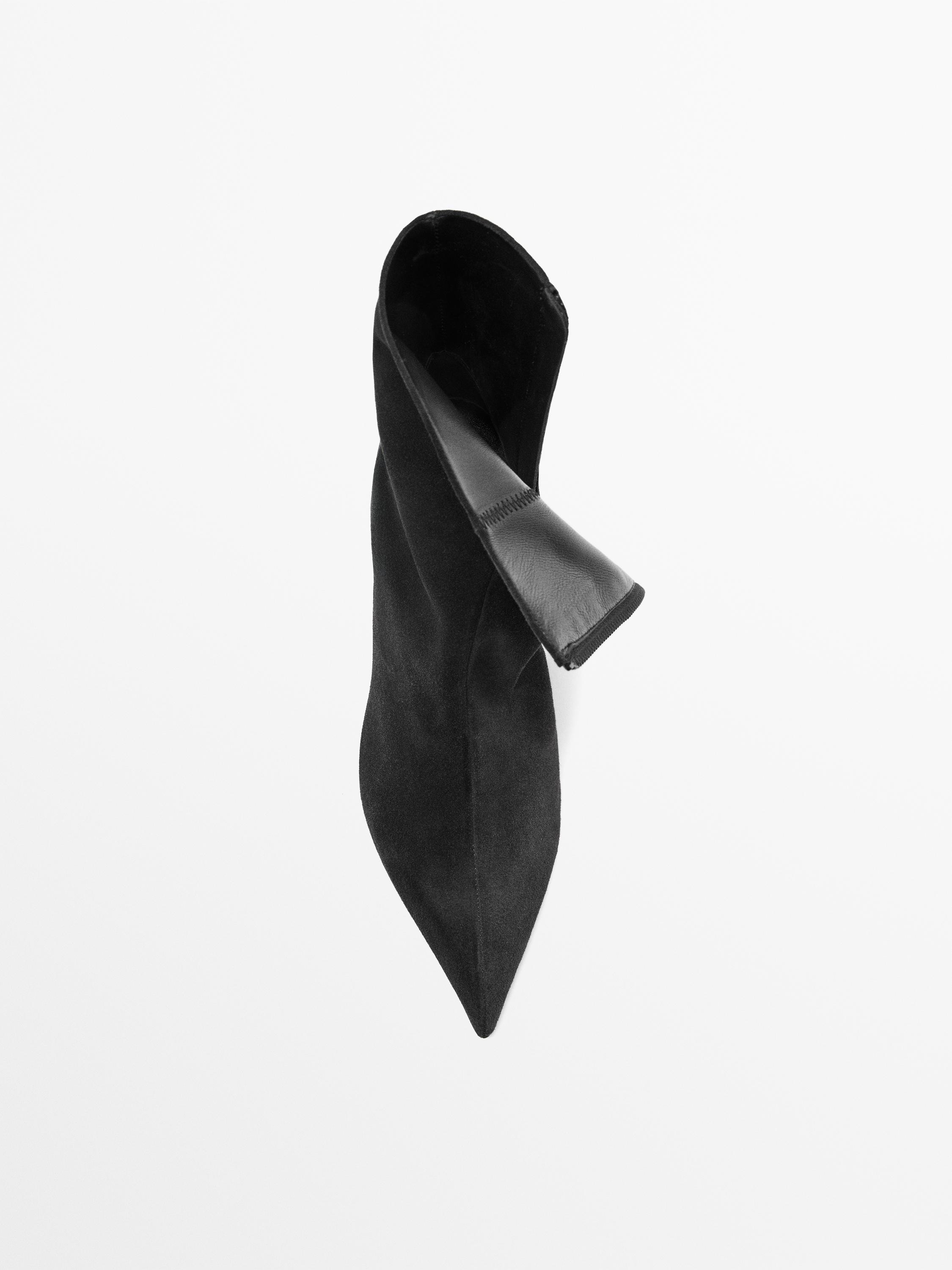 Bottines à talon en croûte de cuir
