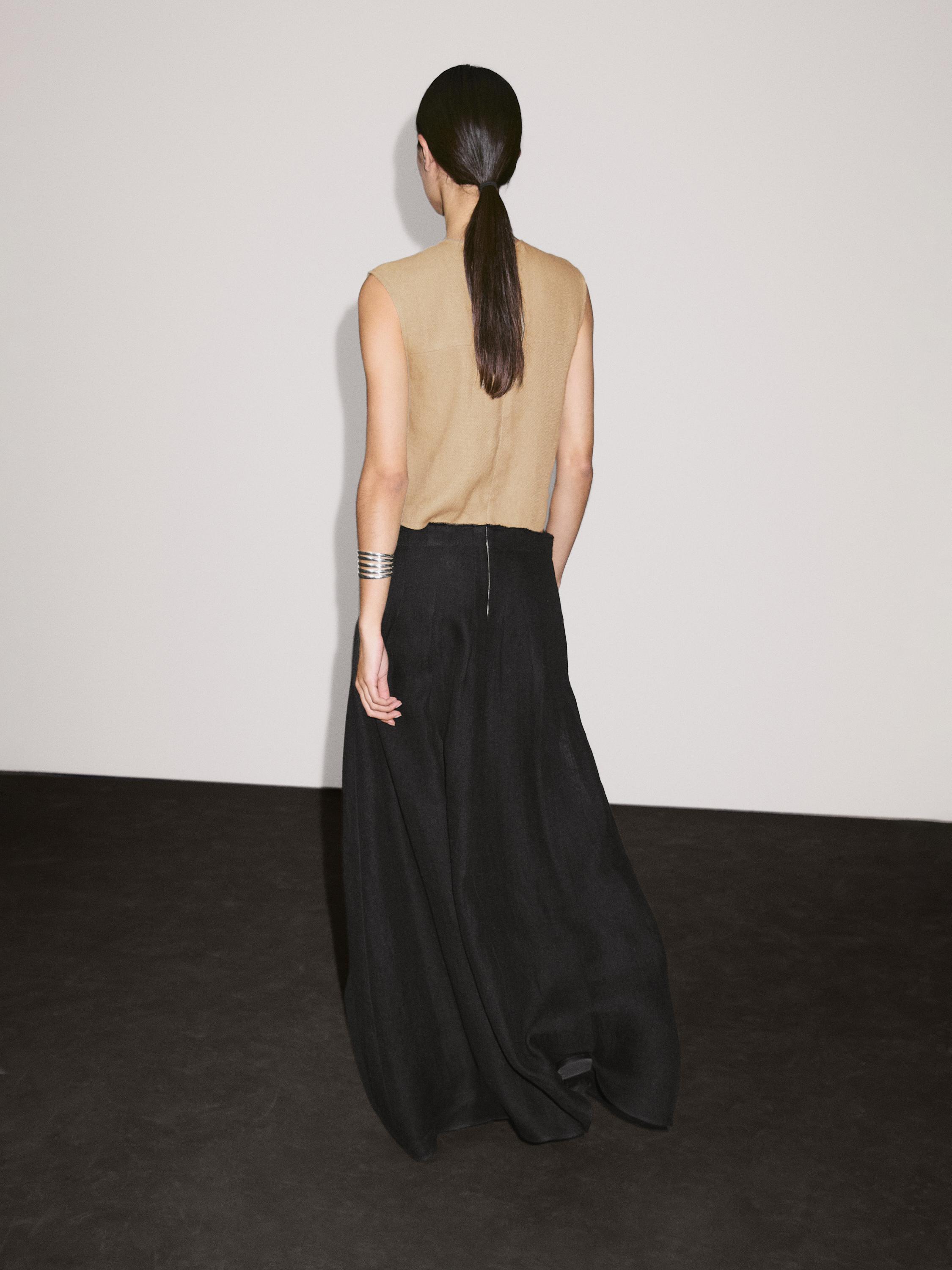 Robe longue bi-matière fendue sur les côtés