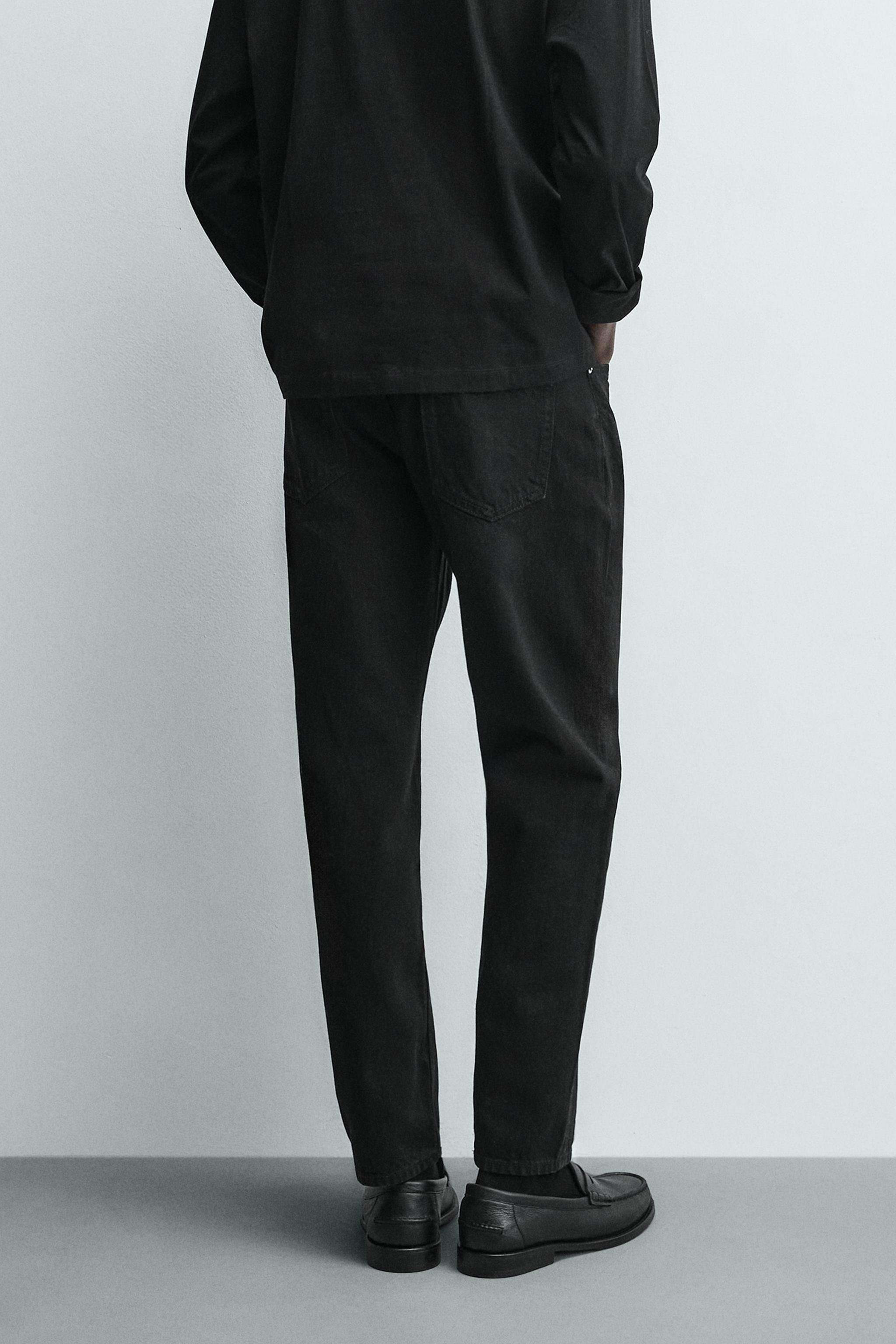 SLIM TAPERED FIT JEANS