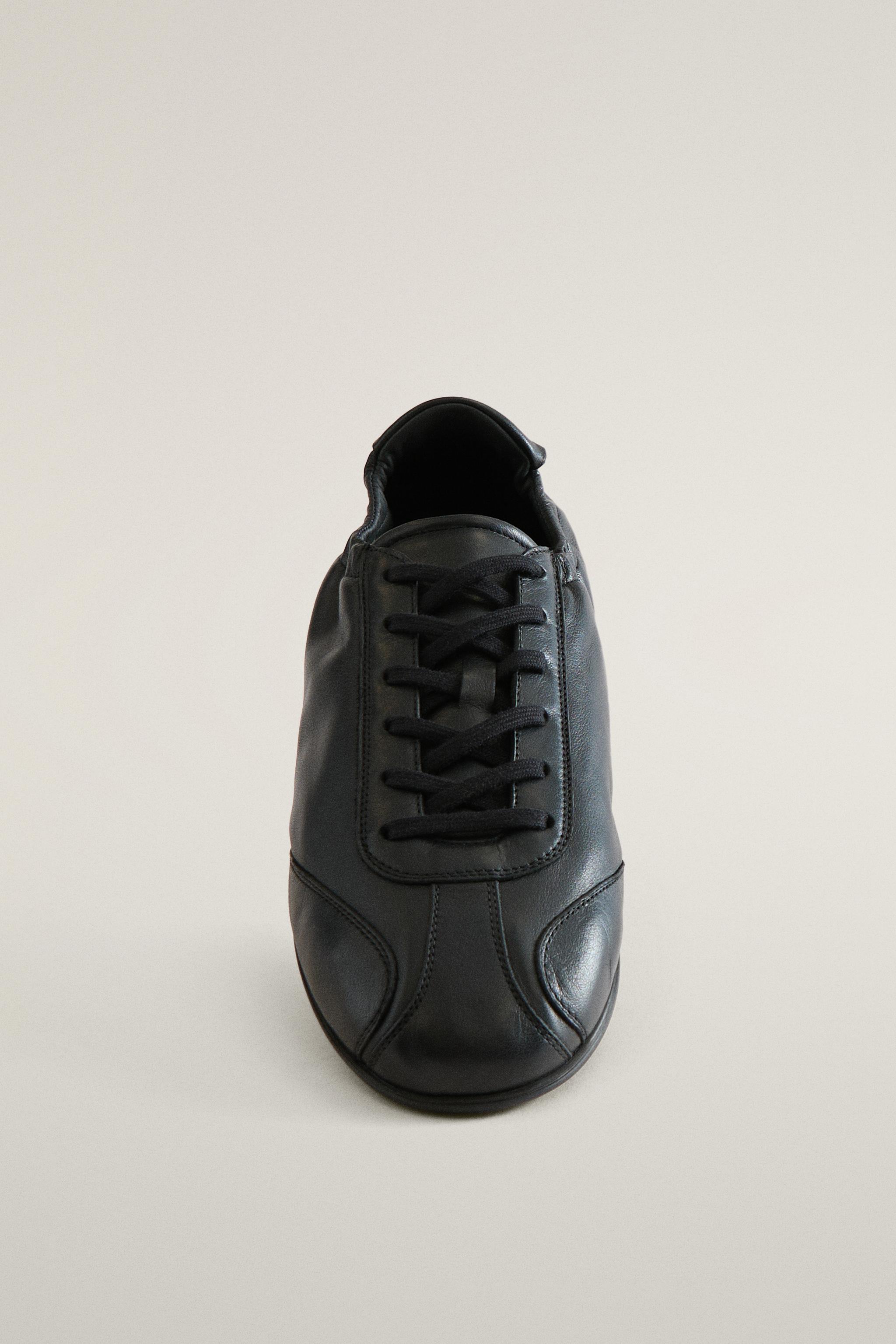 CHAUSSONS TENNIS EN CUIR