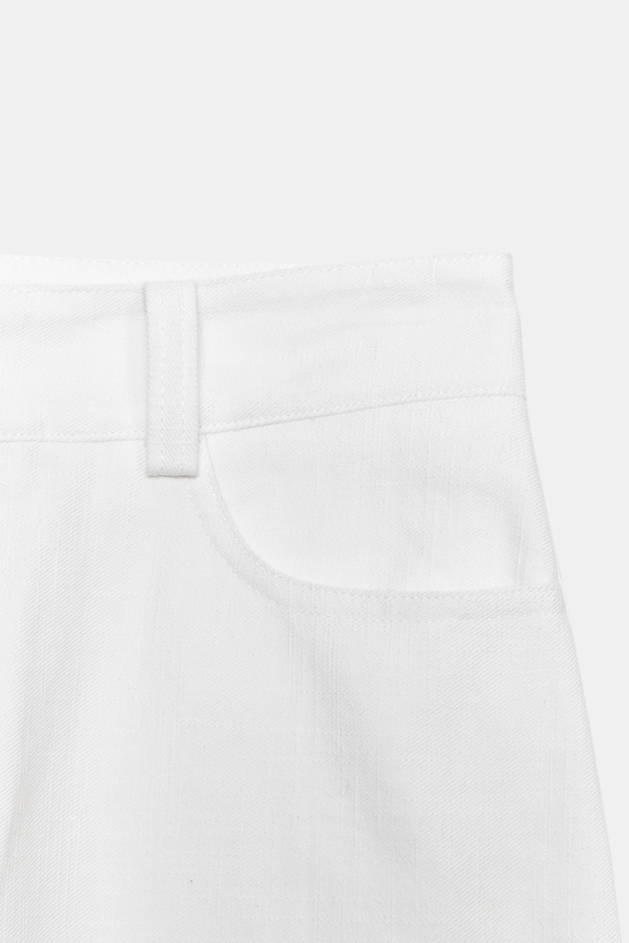 JUPE-CULOTTE À BRODERIES PERFORÉES