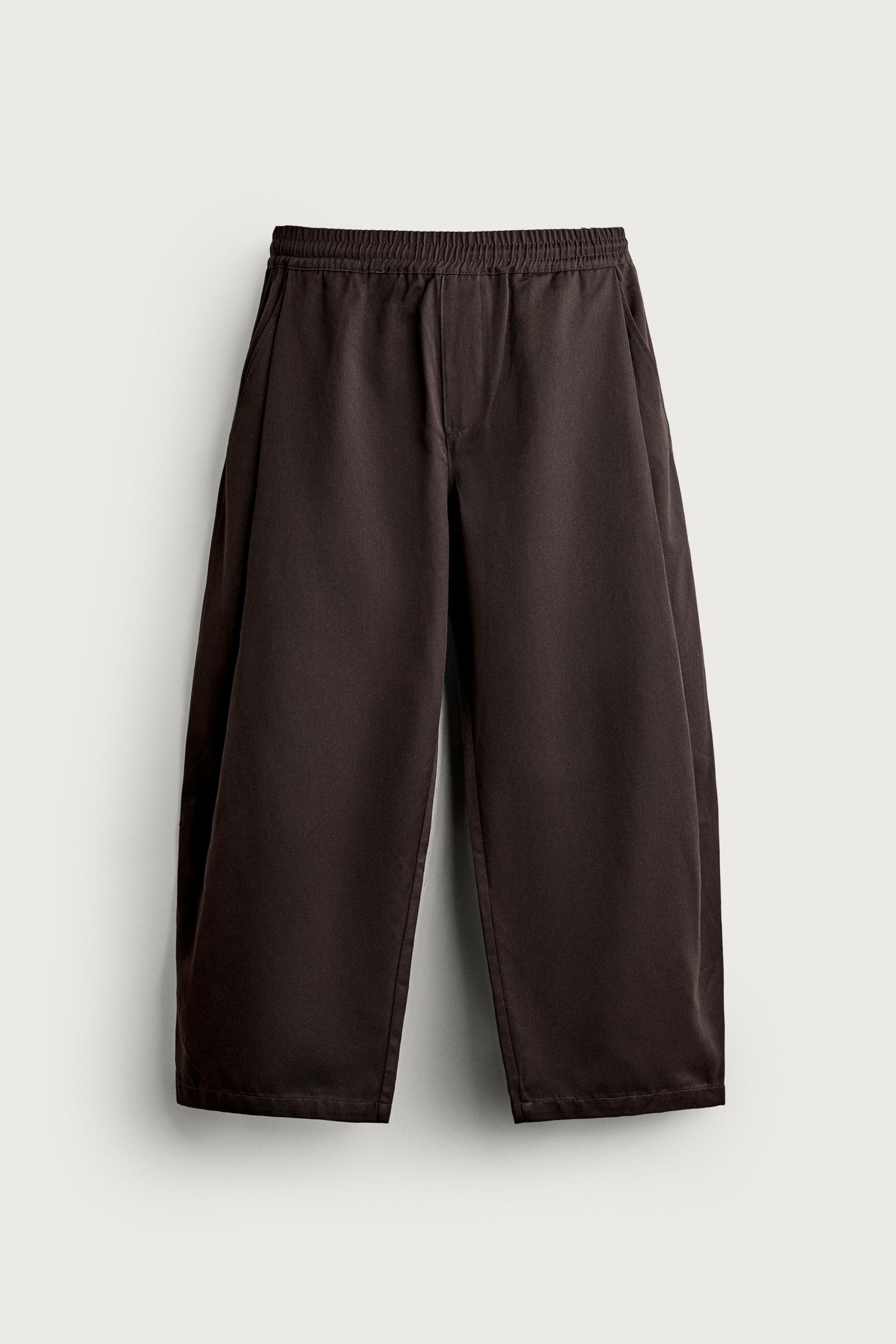 SIDE-PLEAT BALLOON FIT TROUSERS — Brown