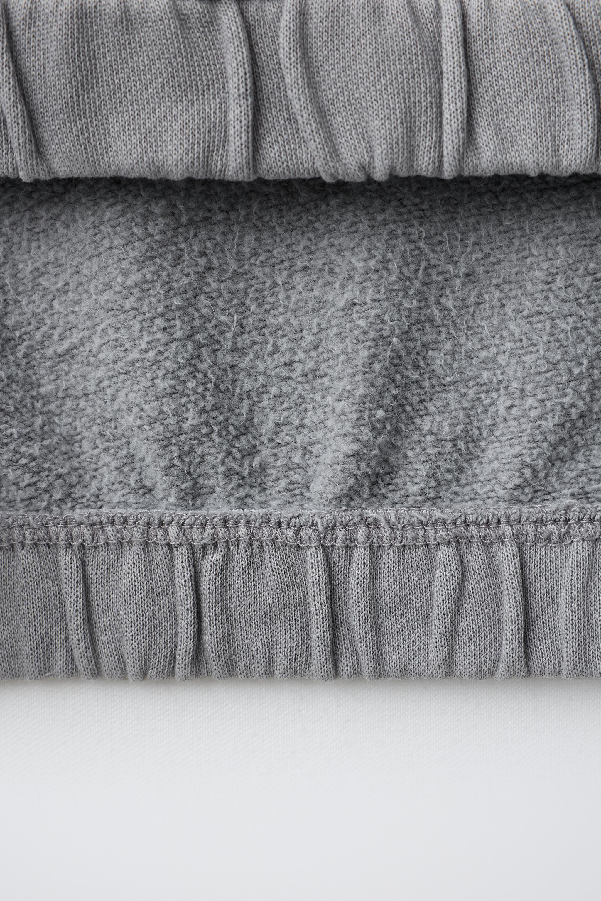 SWEAT IMPRIMÉ EFFET DÉLAVÉ