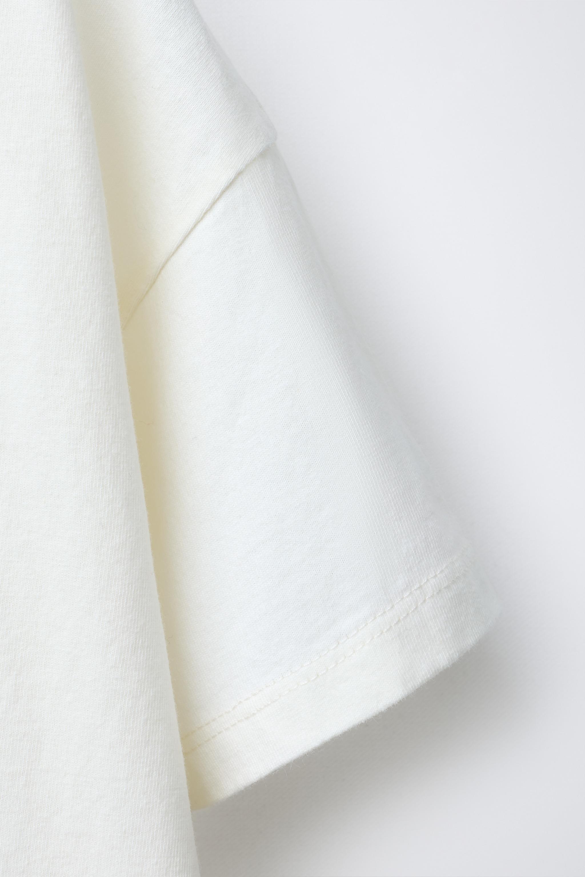 TEE-SHIRT À IMPRIMÉ FORMES GÉOMÉTRIQUES
