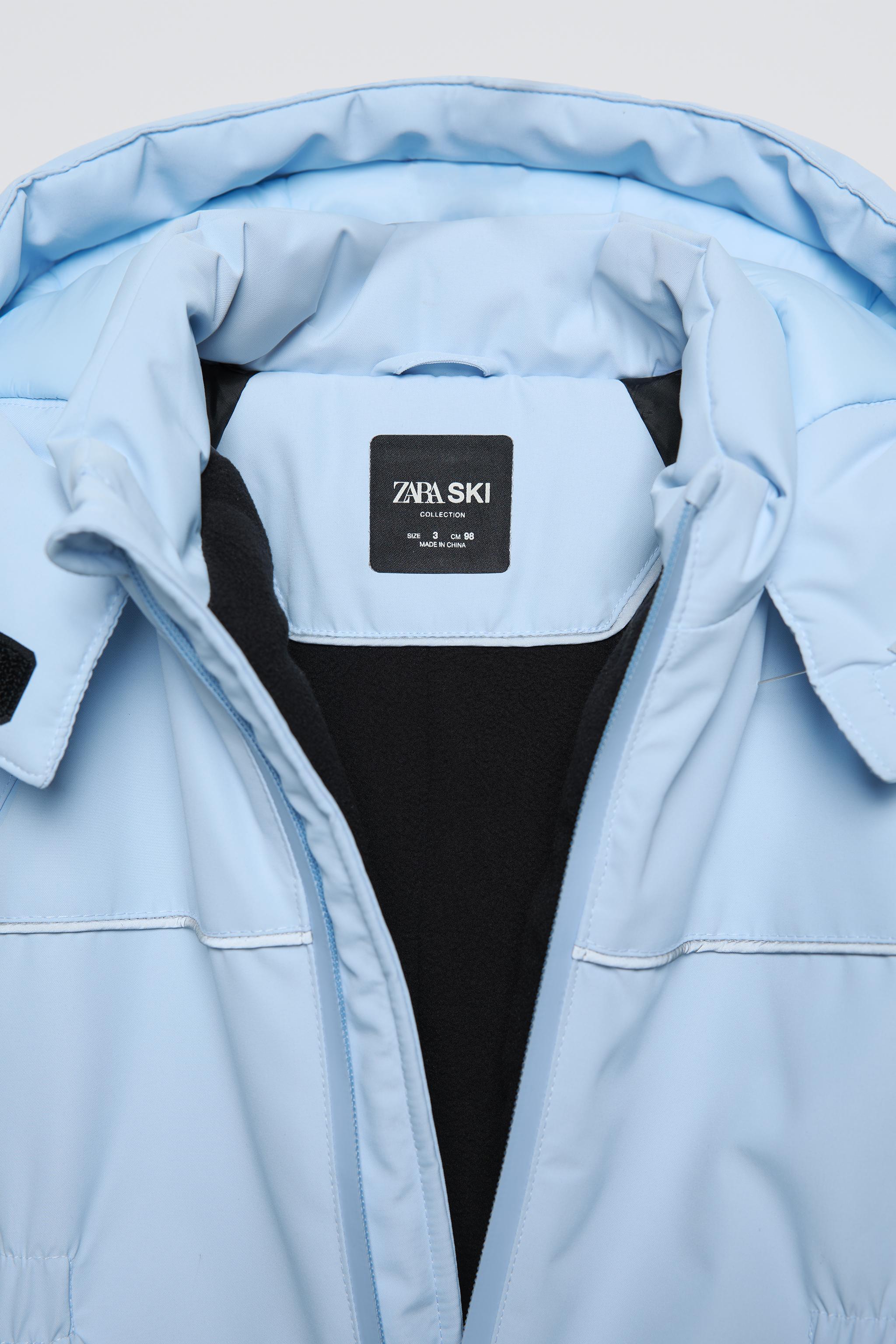 WATER-REPELLENT AND WINDPROOF SKI COLLECTION HOODED JUMPSUIT