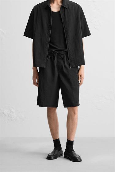 QUẦN SHORT BERMUDA VẢI KỸ THUẬT XẾP LI - Màu đen từ Zara