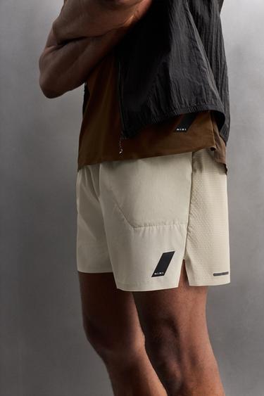SHORT DE RUNNING COLOR BLOCK - Blanc cassé de Zara