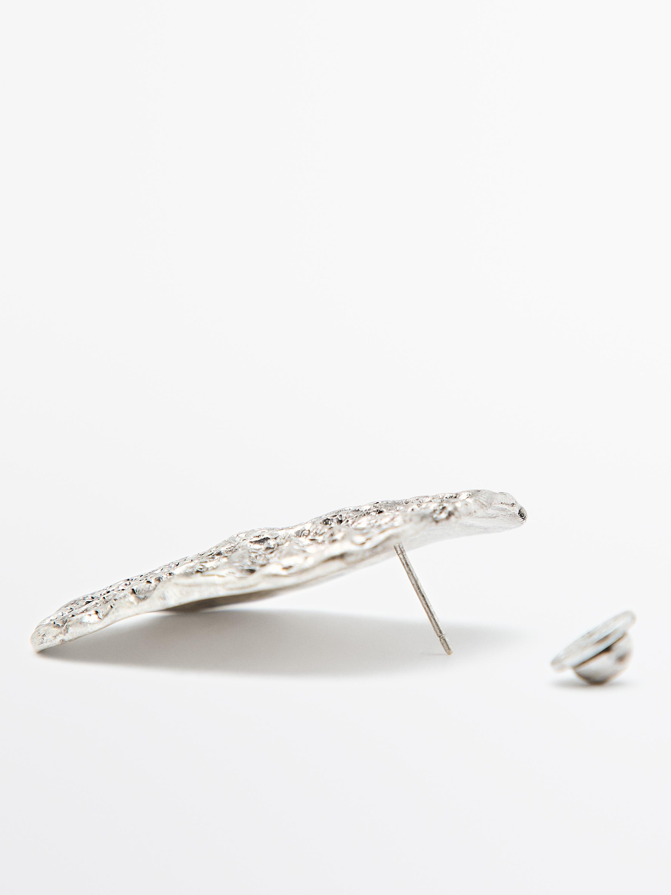 Textured medallion earrings