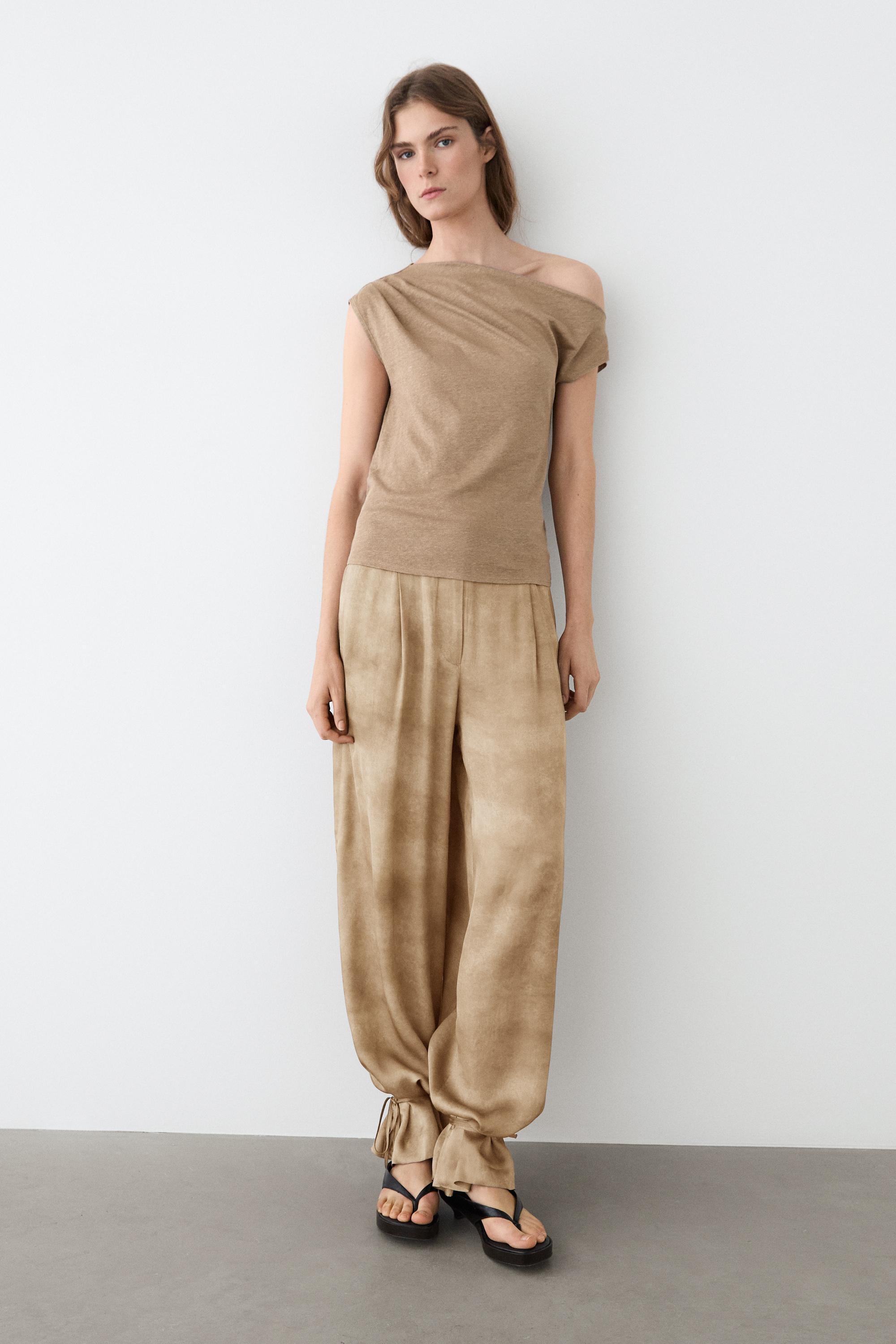 Asymmetric linen blend top with draped detail