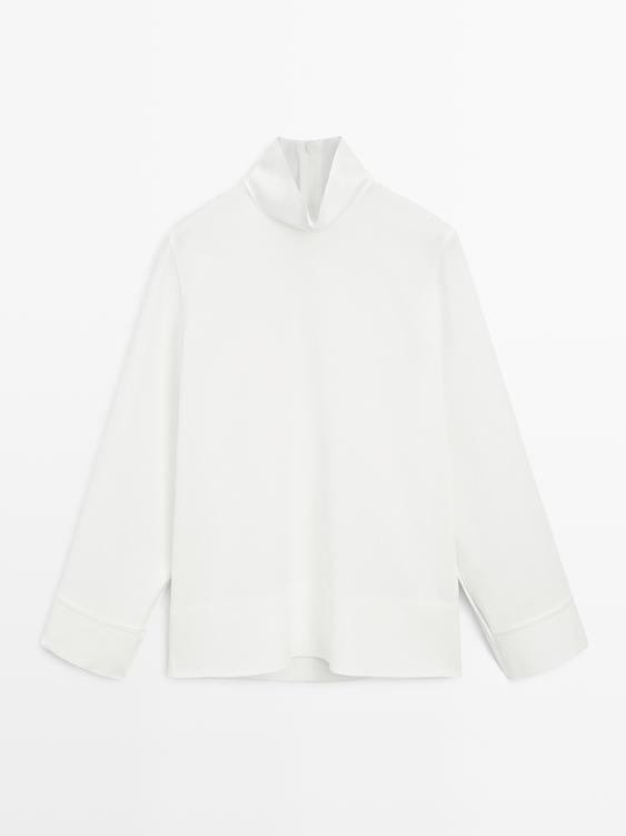 High neck blouse with hem detail