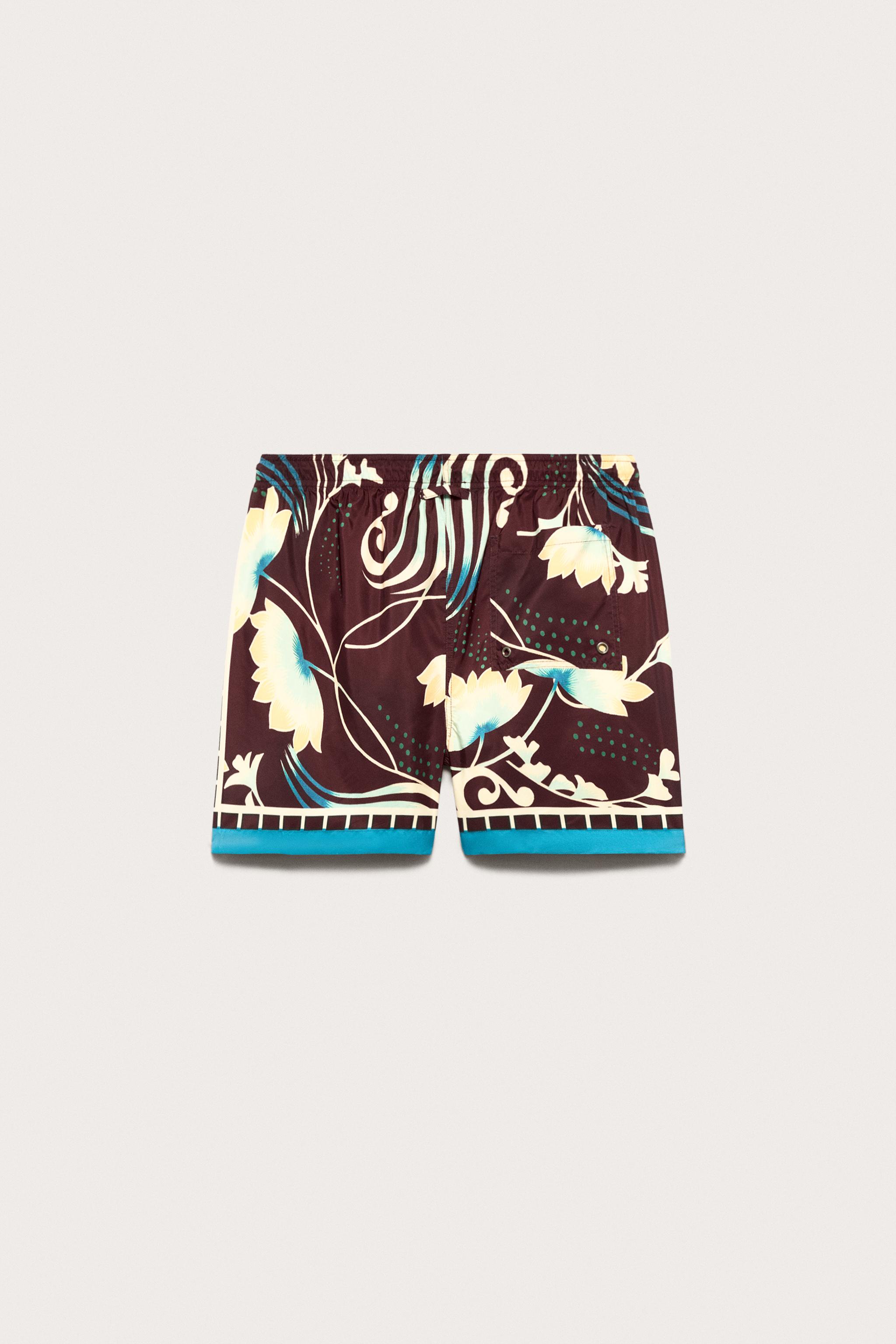 LIMITED EDITION MIXED PRINT SWIM SHORTS