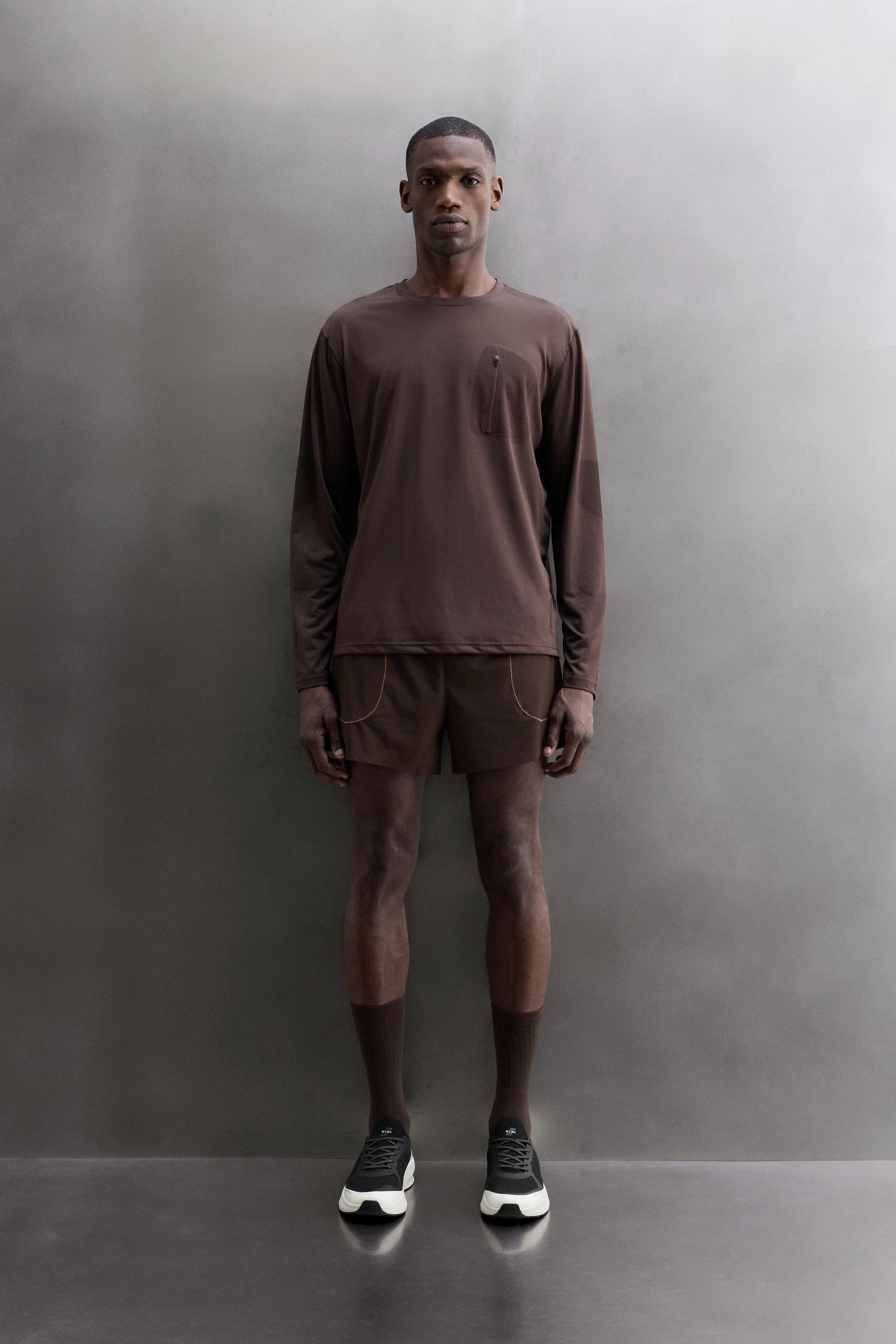 T-SHIRT TECHNIQUE À MANCHES LONGUES AVEC POCHE