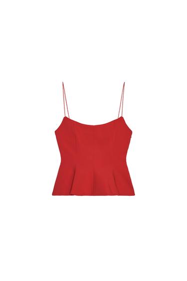 Front view of a red top with spaghetti straps and a flared hem.