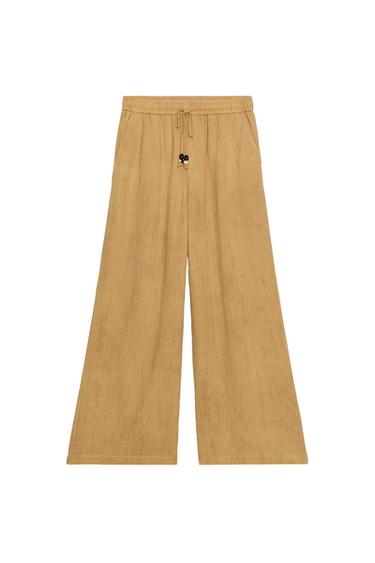 PANTALÓN ANCHO CORDÓN - Mostaza de Zara