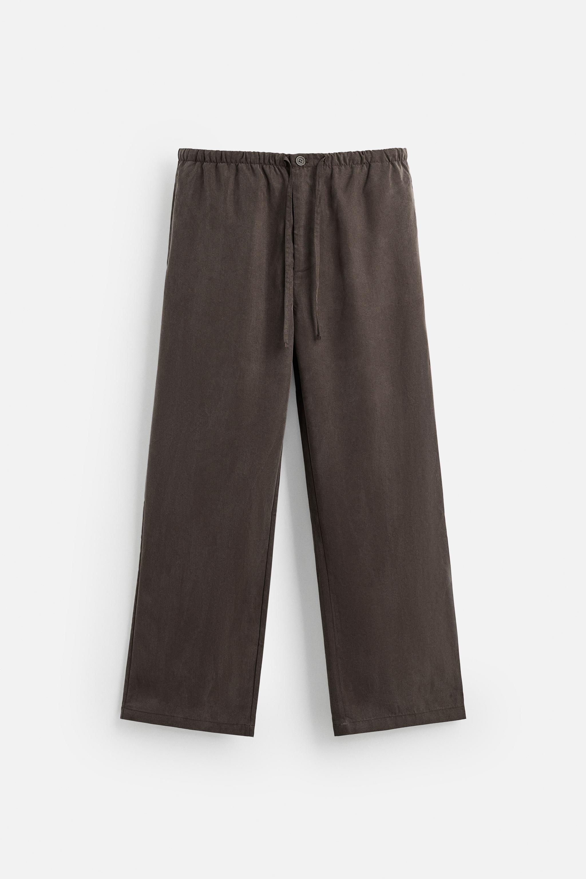 RELAXED FIT FLOWY PANTS