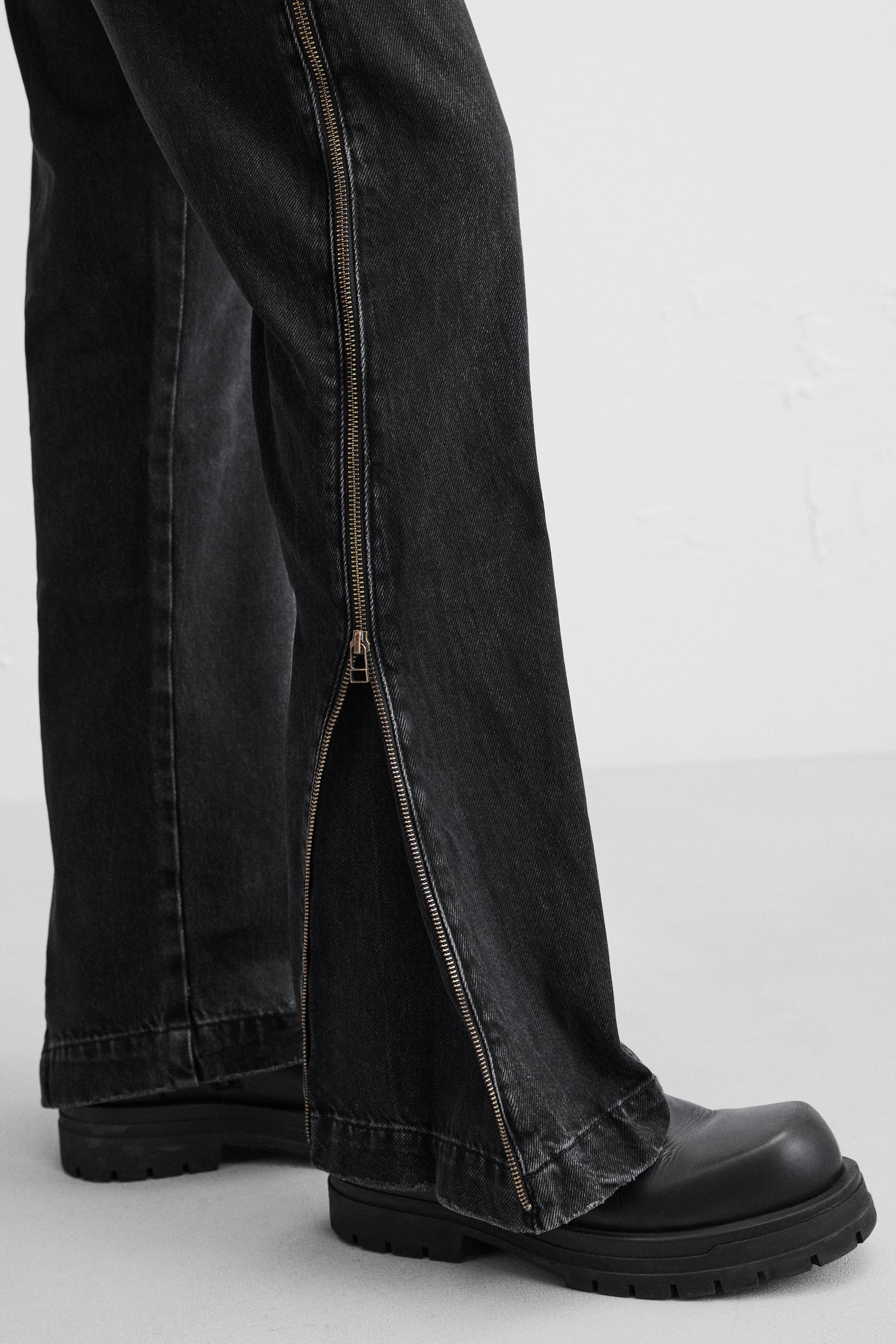 FLARE FIT ZIPPERED JEANS