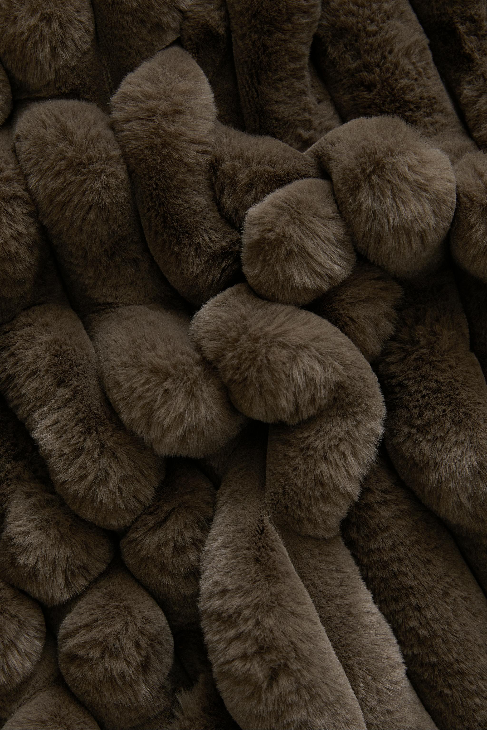 TUBULAR EMBOSSED FUR BLANKET