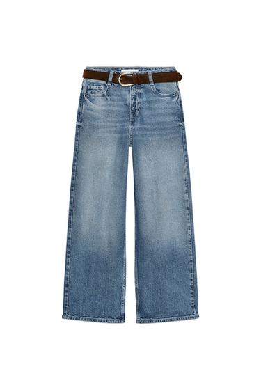 Front view of blue jeans with a brown belt and front pockets.