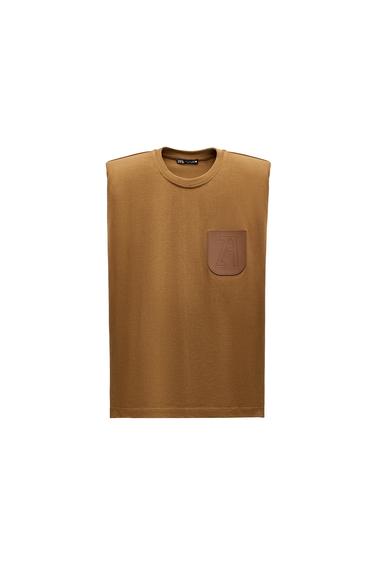 TOP WITH PADDED SHOULDERS AND LABEL