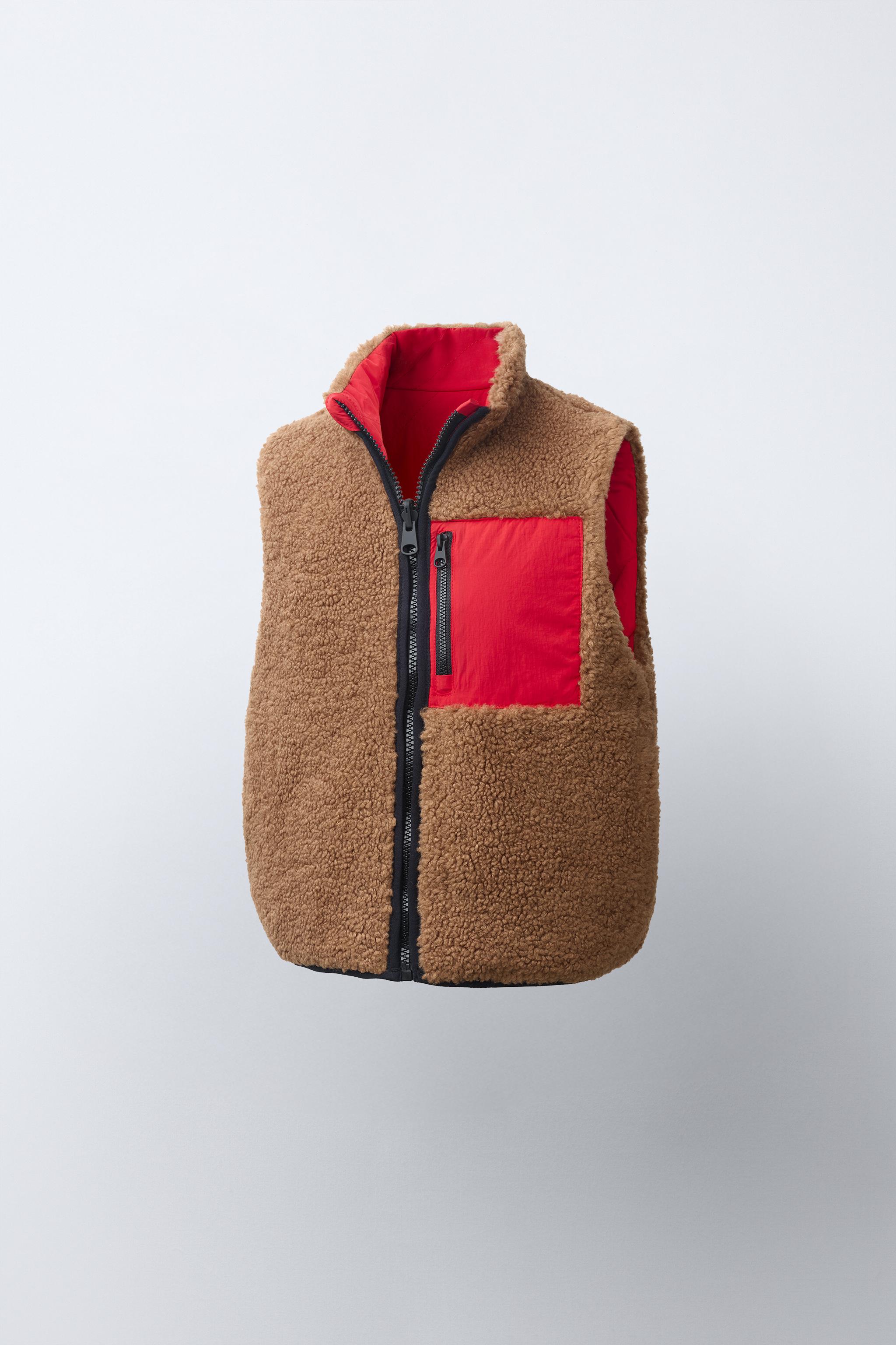 GILET SANS MANCHES RÉVERSIBLE EFFET MOUTON