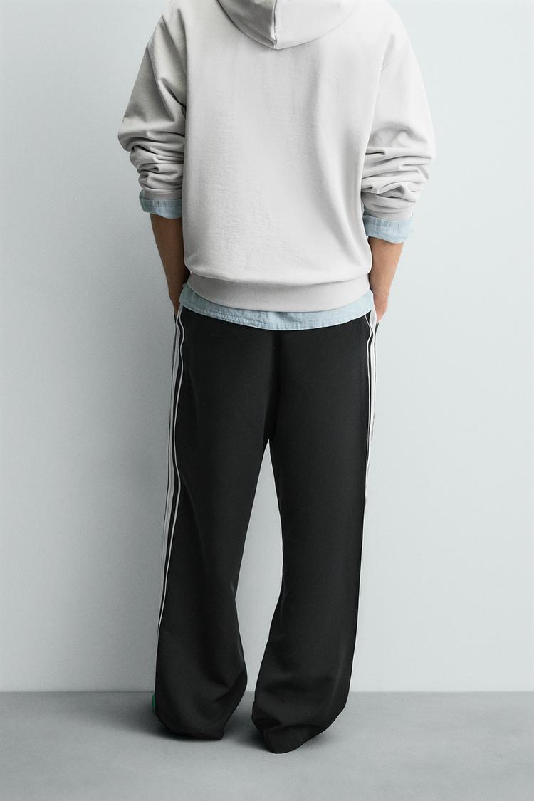 WIDE FIT JOGGER PANTS WITH SIDE STRIPES
